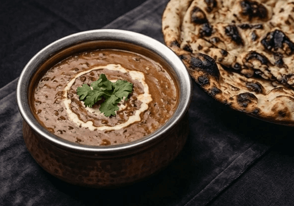 Concept: dal with naan, dark studio lighting